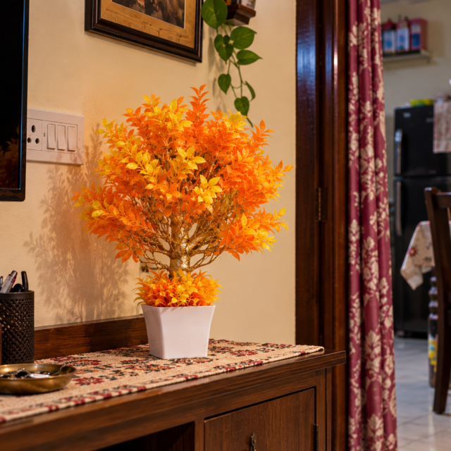AARAYANA Vanya Luxe – Golden Amber Artificial Tree in White Planter for Premium Interiors